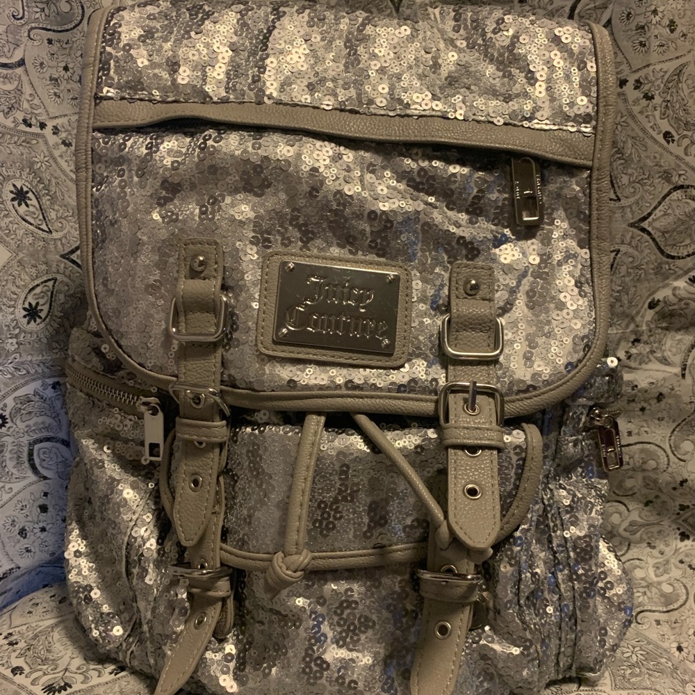 Juicy Couture silver backpack.